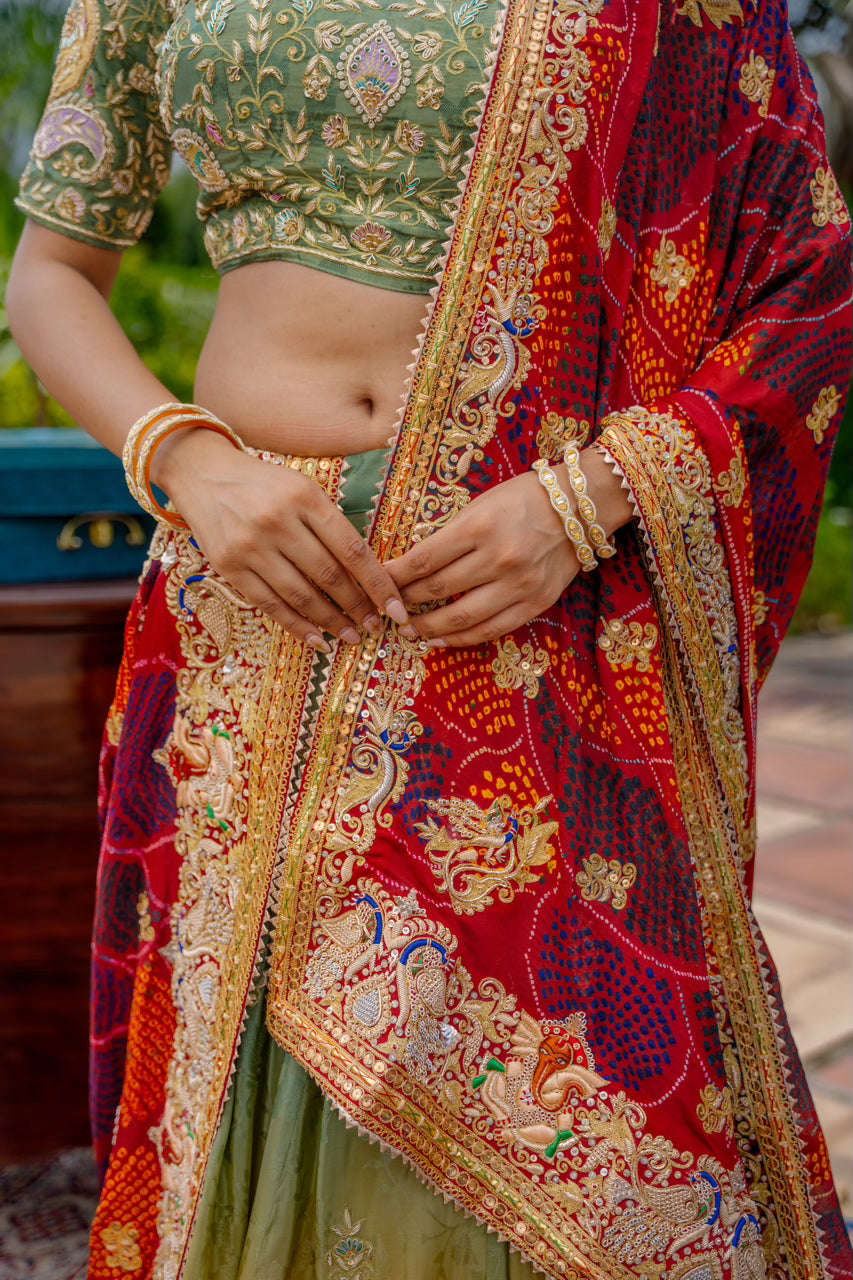 Maroon Pure Ojariya Bandhej Chunari with Kardana Sequins Thread Peacock Ganesh Ji Motif Work