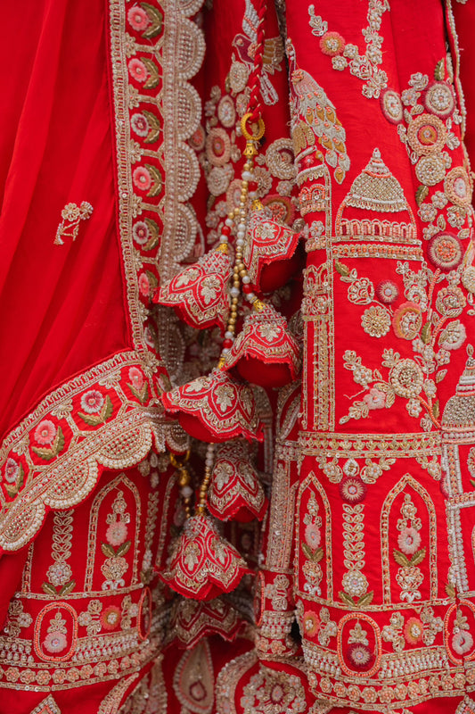 Red Raw Silk Bridal Lehenga with Marodi Kardana Sequis Moti Work