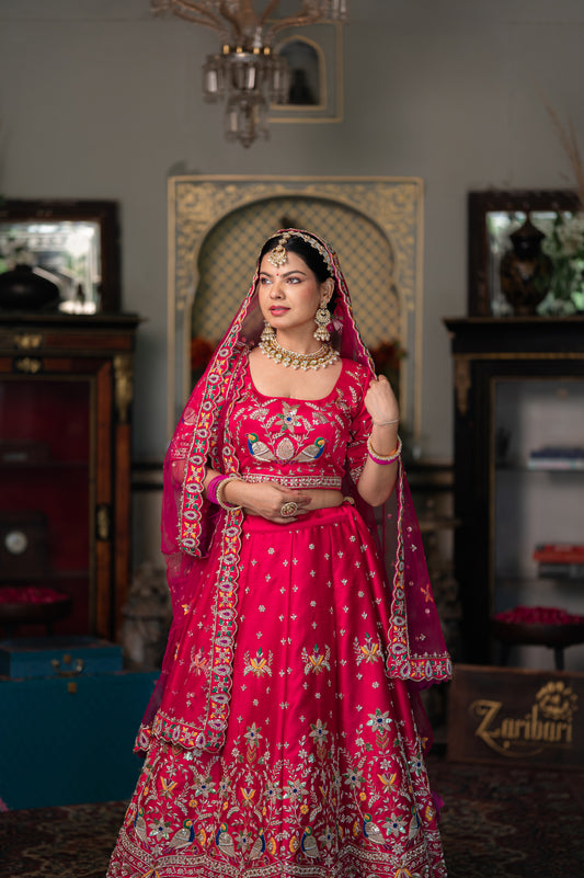 Pink Red Raw Silk Bridal Lehenga with Zardozi Birds Motifs Sequins and Moti Work