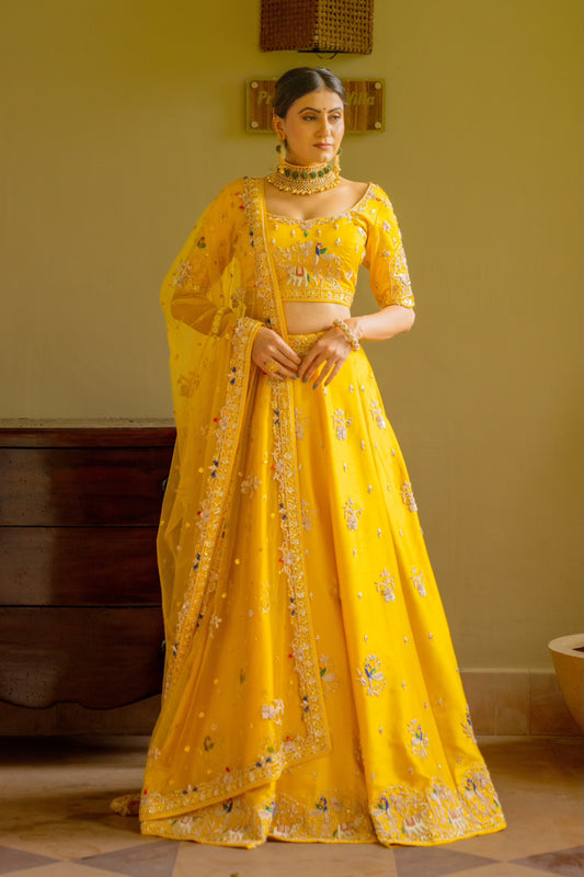 Yellow Raw Silk Lehenga with Zardozi Sequins Thread Peacock Elephant Motif Work