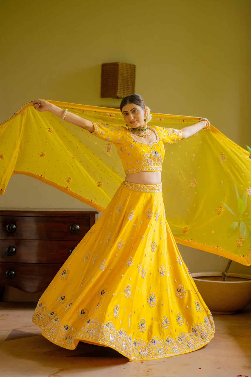 Yellow Raw Silk Lehenga with Zardozi Sequins Thread Peacock Elephant Motif Work