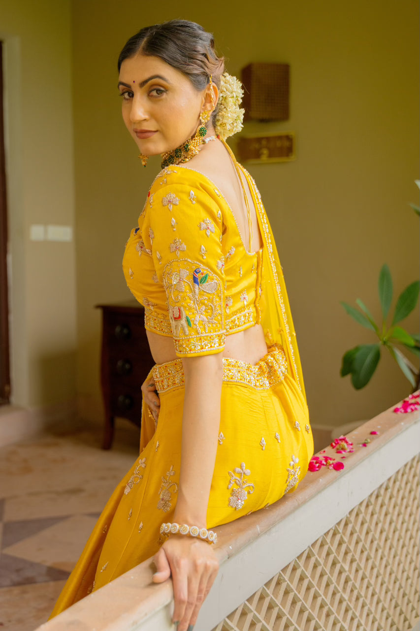 Yellow Raw Silk Lehenga with Zardozi Sequins Thread Peacock Elephant Motif Work