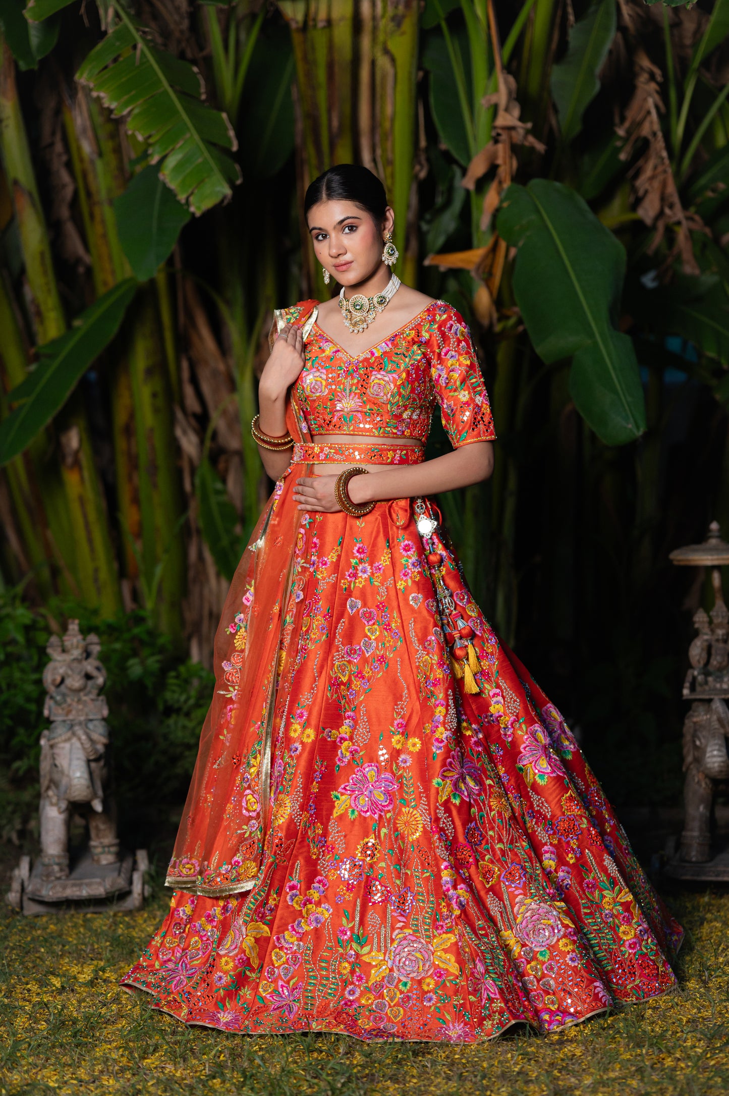 Orange Raw Silk Resham Mirror Work Design Lehenga