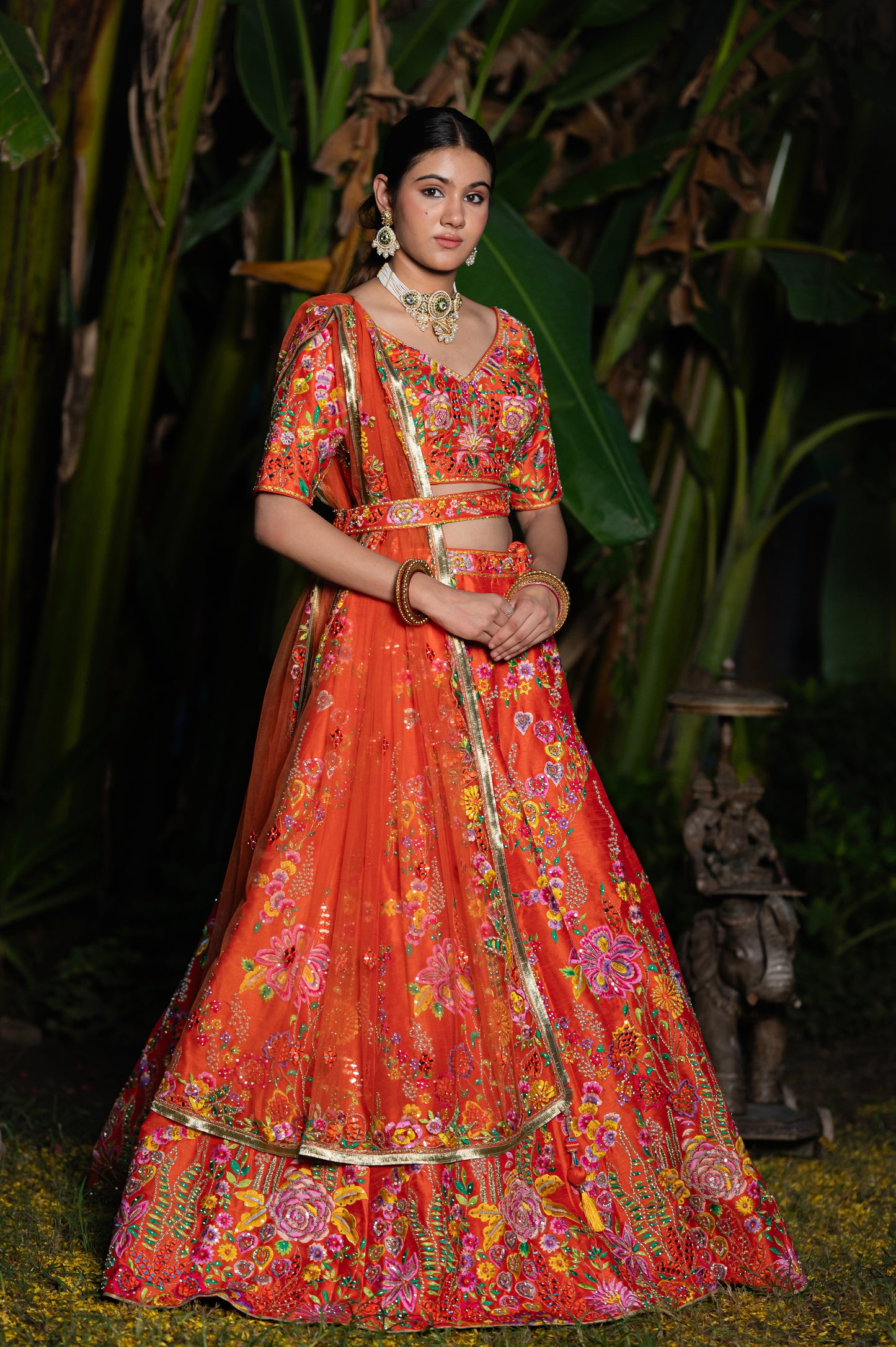 Orange Raw Silk Resham Mirror Work Design Lehenga