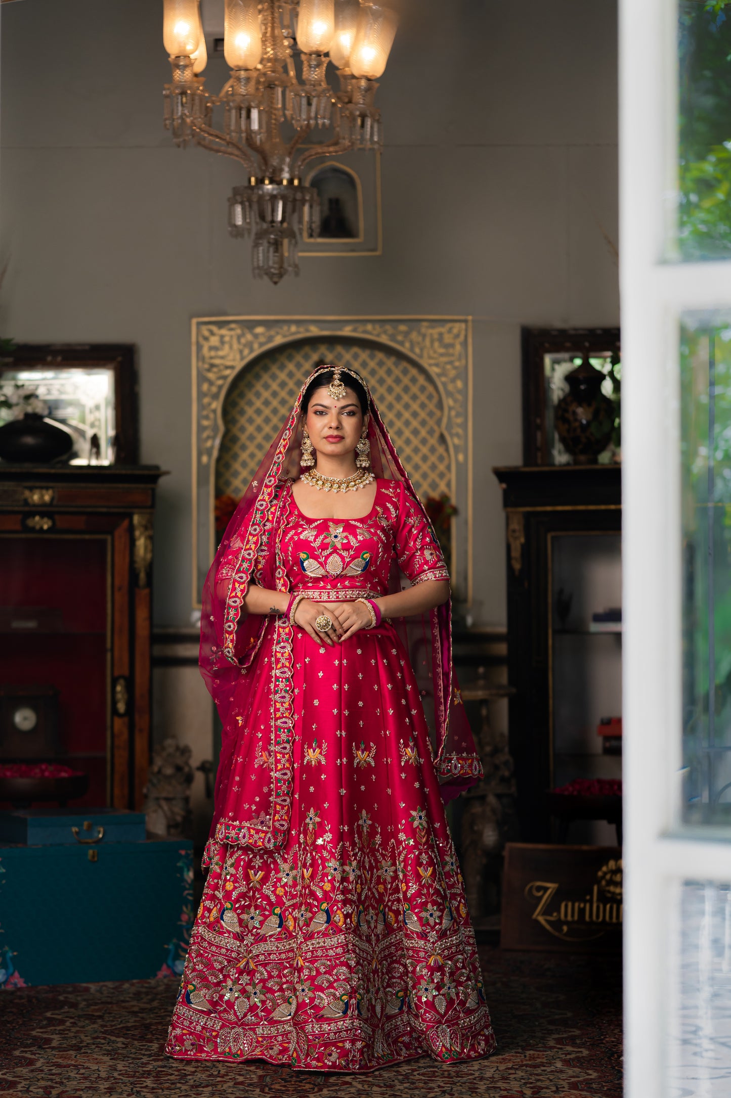 Pink Red Raw Silk Bridal Lehenga with Zardozi Birds Motifs Sequins and Moti Work