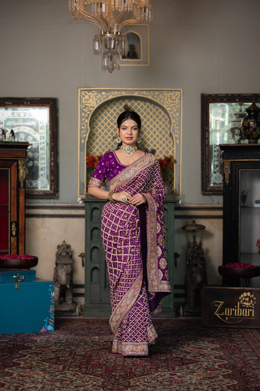A stunning purple pure khaddi georgette meenakari saree featuring thread kardana sequins work saree beautifully adorned with fine craftsmanship and exquisite detailing, perfect for festive and special occasions.