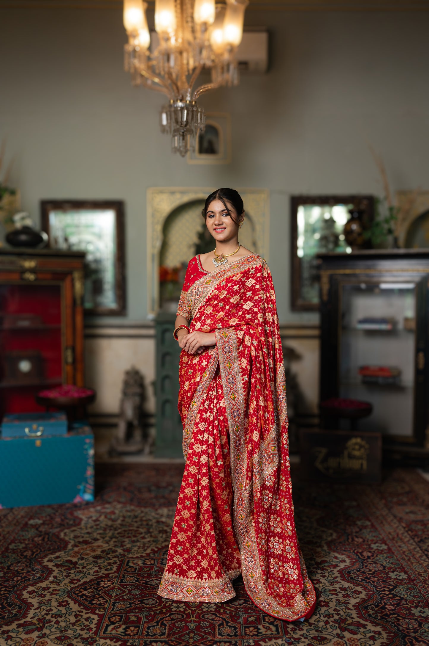 A stunning red pure khaddi georgette meenakari saree featuring thread kardana sequins work saree beautifully adorned with fine craftsmanship and exquisite detailing, perfect for festive and special occasions.