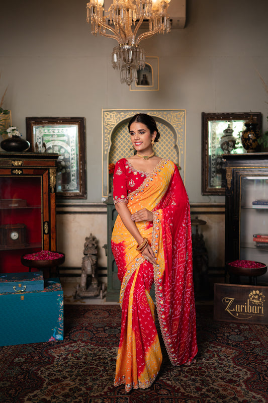 A stunning red yellow pure georgette saree featuring marodi sequins kardana and moti work saree beautifully adorned with fine craftsmanship and exquisite detailing, perfect for festive and special occasions.
