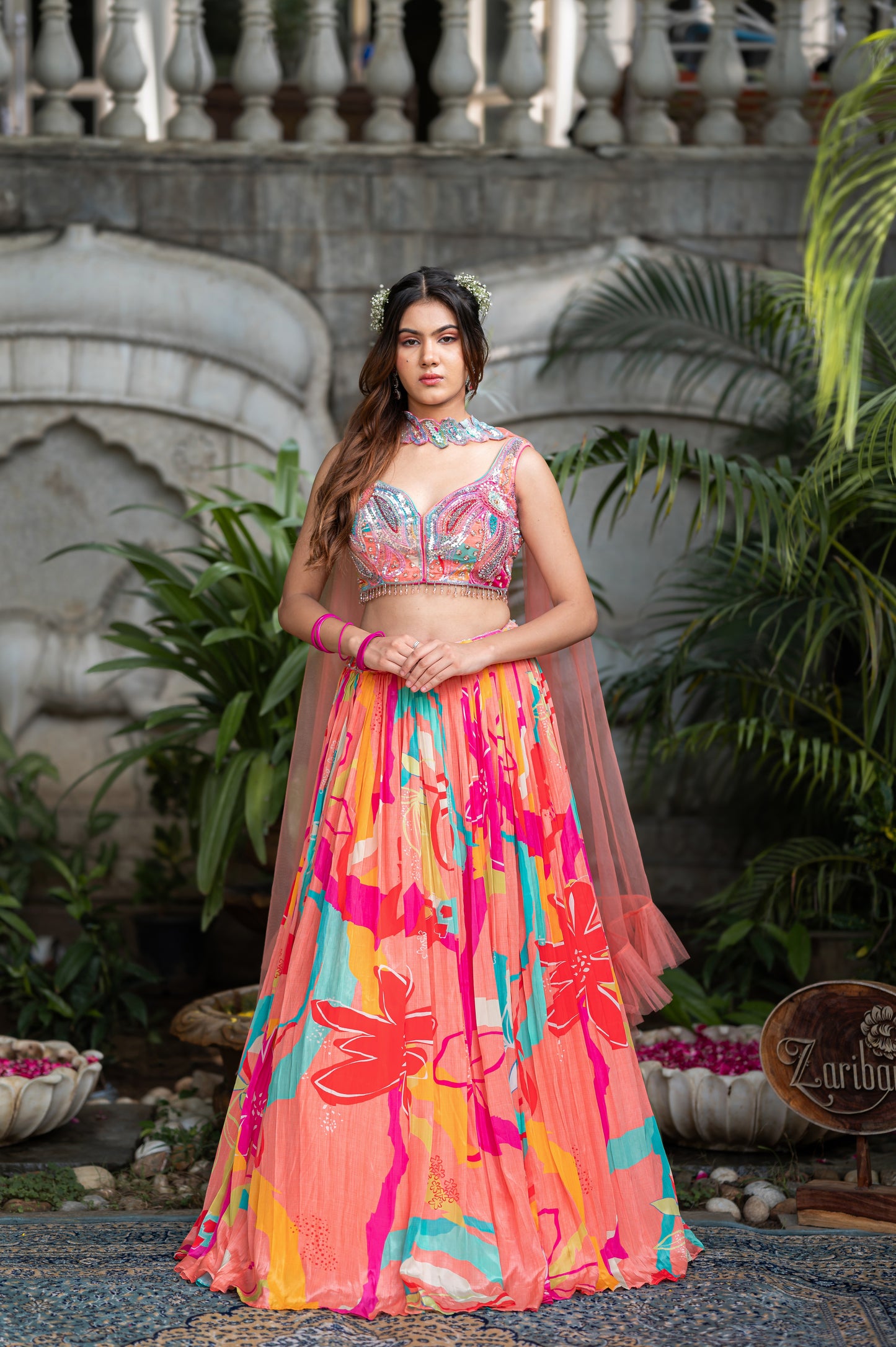 Peach Aura Crepe Silk Lehenga Set With Hand-Embroidered Crop Top