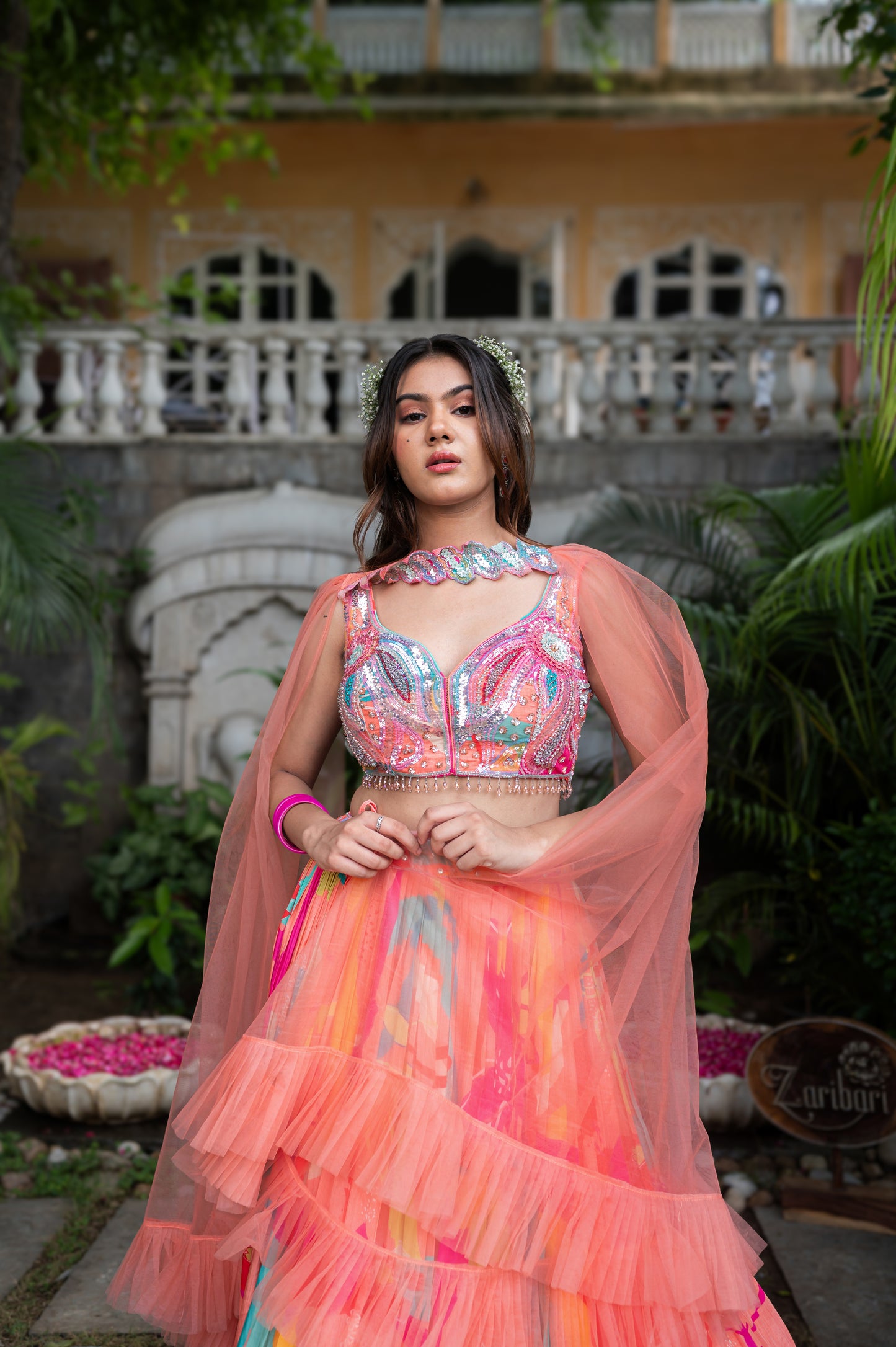 Peach Aura Crepe Silk Lehenga Set With Hand-Embroidered Crop Top