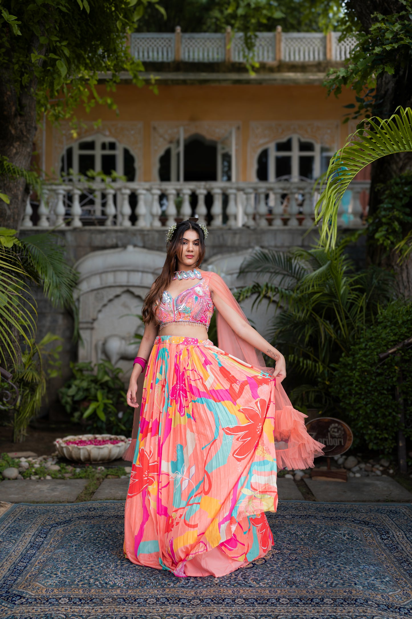 Peach Aura Crepe Silk Lehenga Set With Hand-Embroidered Crop Top