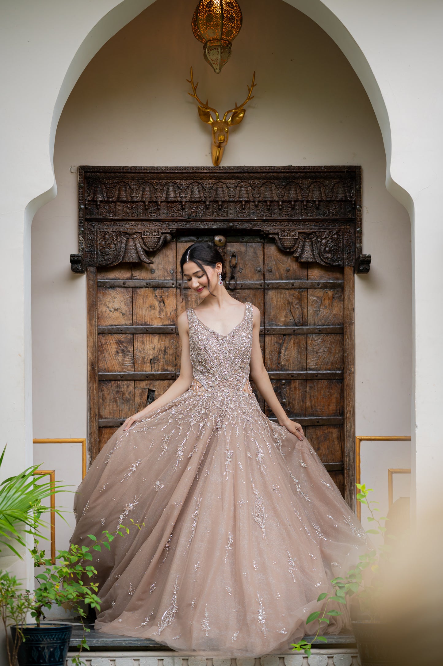 A stunning dark grayish orange soft net indo western featuring kardana sequins work indo western beautifully adorned with fine craftsmanship and exquisite detailing, perfect for festive and special occasions.