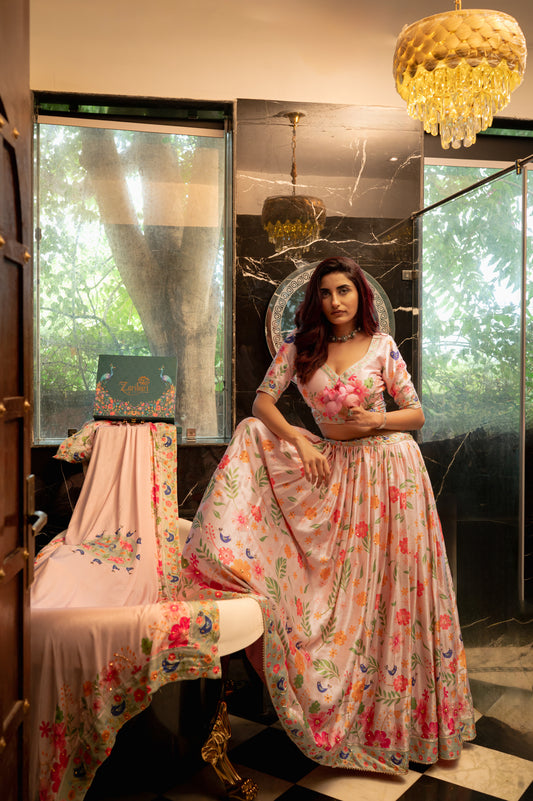 A stunning light pink gajji silk lehenga featuring digital print and sequins work lehenga beautifully adorned with fine craftsmanship and exquisite detailing, perfect for festive and special occasions.