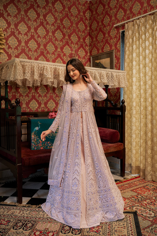 A stunning pink flare net indo western featuring sequins and beads work indo western beautifully adorned with fine craftsmanship and exquisite detailing, perfect for festive and special occasions.