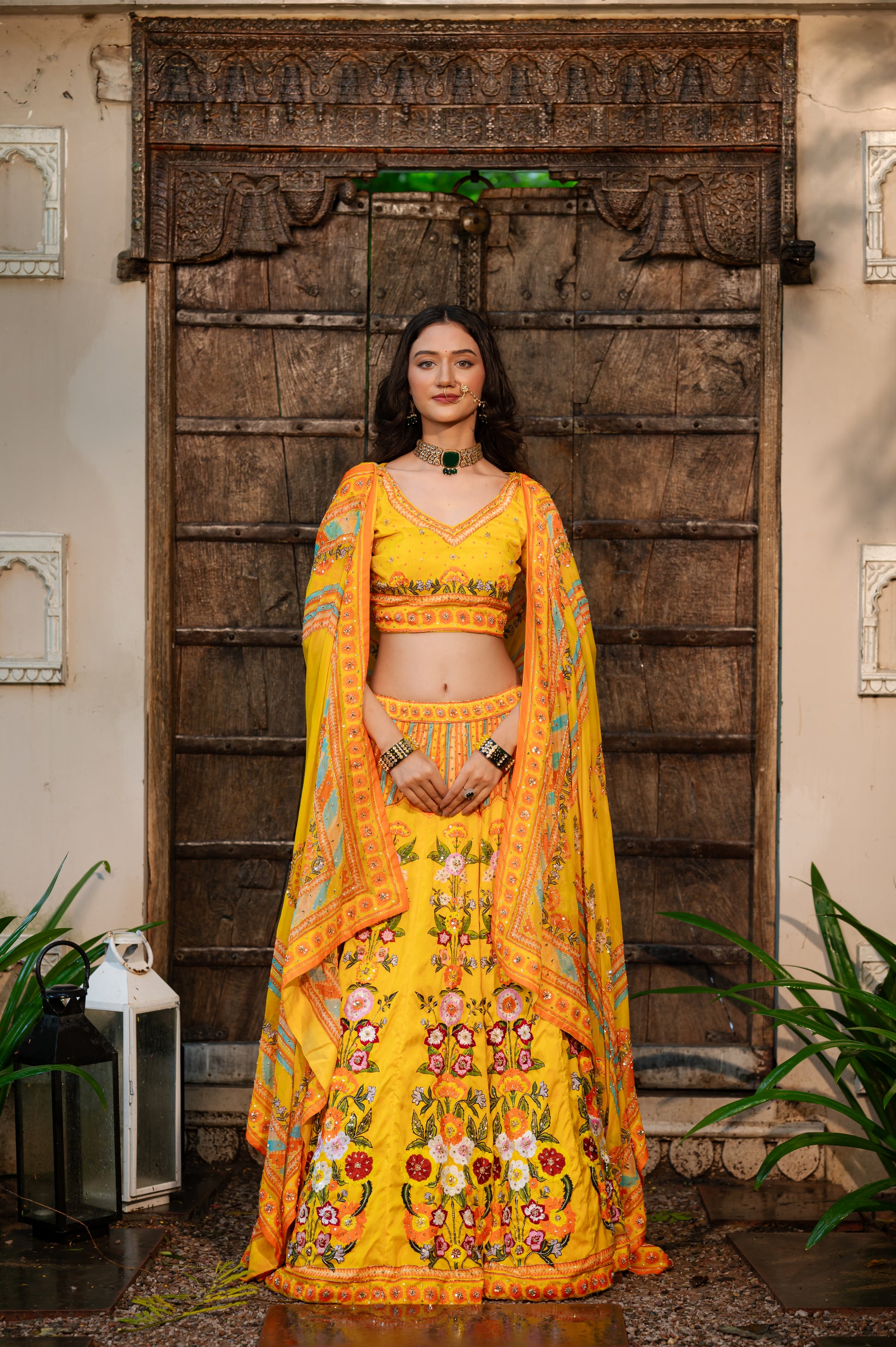 A stunning mango yellow silk lehenga featuring thread kardana sequins work lehenga beautifully adorned with fine craftsmanship and exquisite detailing, perfect for festive and special occasions.