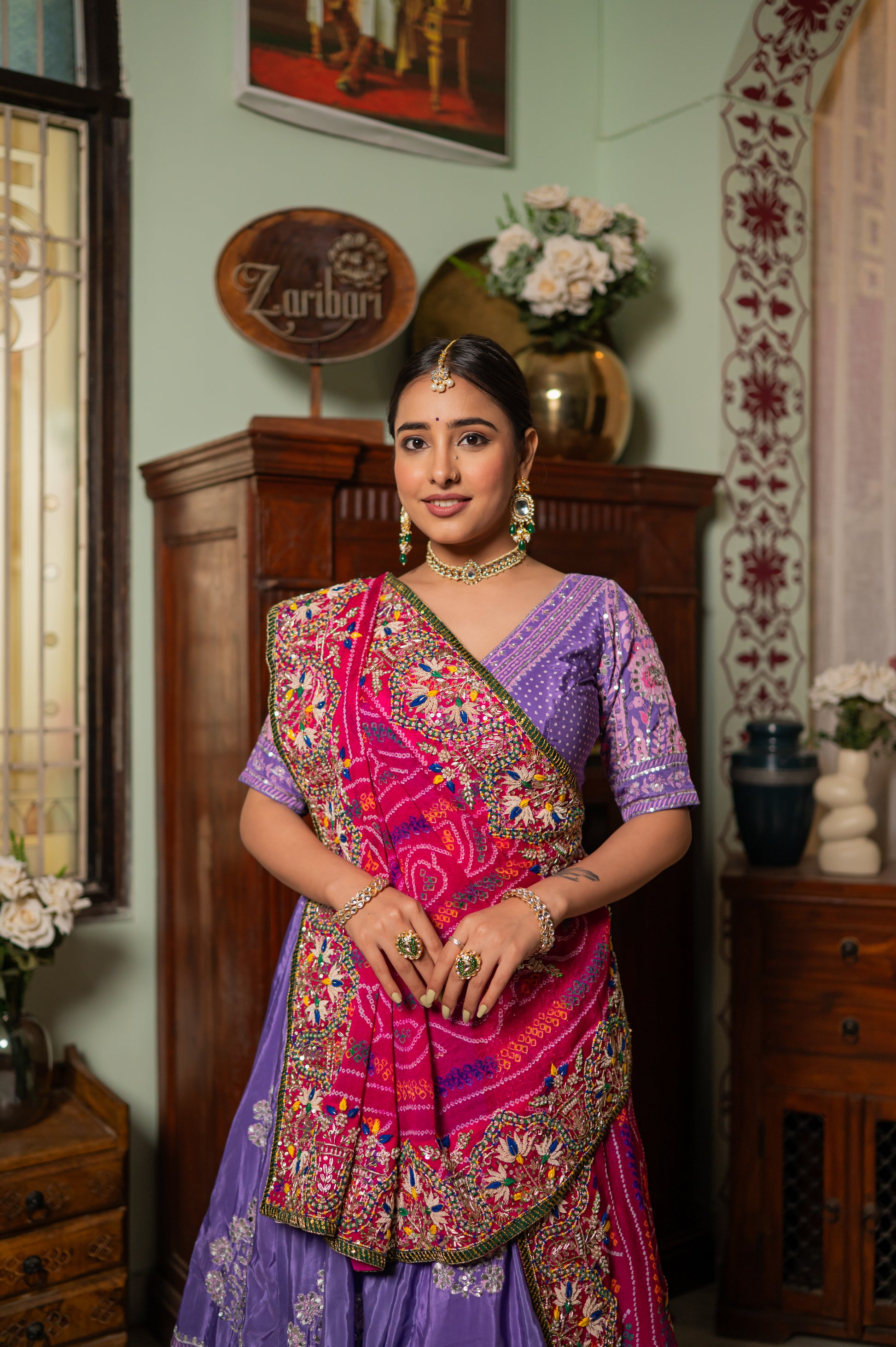 A stunning pink pure ojariya bandhej chunari featuring zardozi thread sequins pearl work chunari beautifully adorned with fine craftsmanship and exquisite detailing, perfect for festive and special occasions.