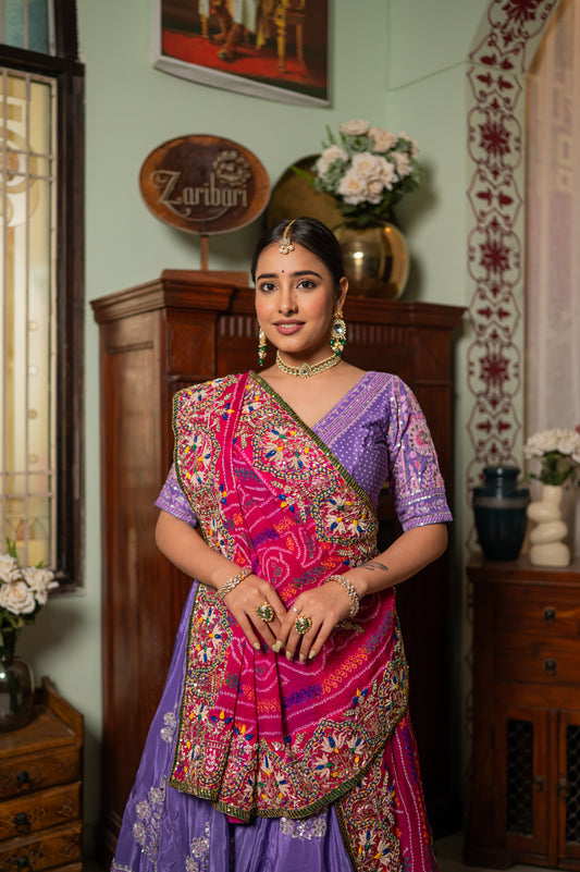 A stunning pink pure ojariya bandhej chunari featuring zardozi thread sequins pearl work chunari beautifully adorned with fine craftsmanship and exquisite detailing, perfect for festive and special occasions.