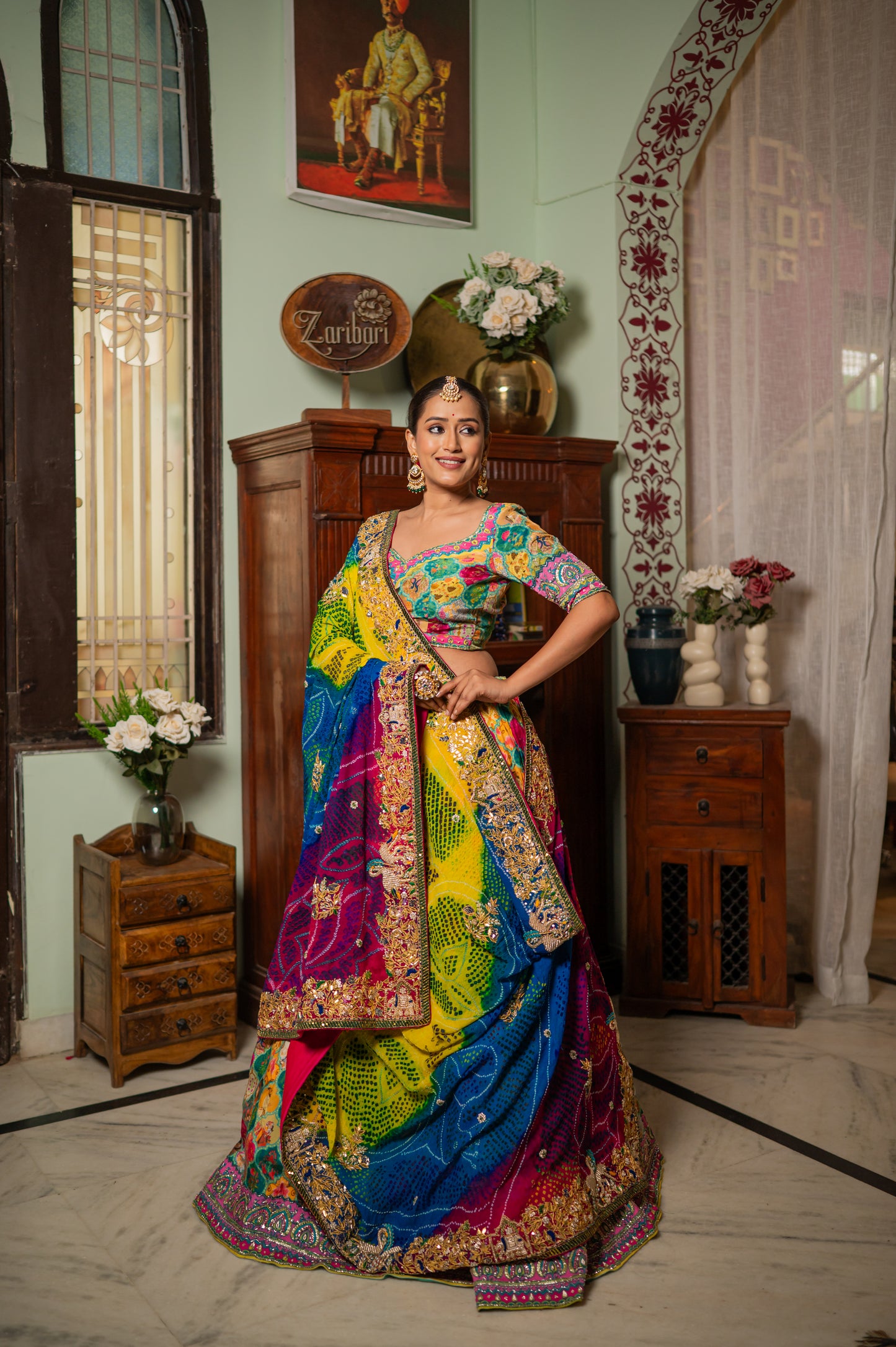 A stunning pink yellow sky blue multi pure ojariya bandhej chunari featuring zardozi double swan gota patti work chunari beautifully adorned with fine craftsmanship and exquisite detailing, perfect for festive and special occasions.