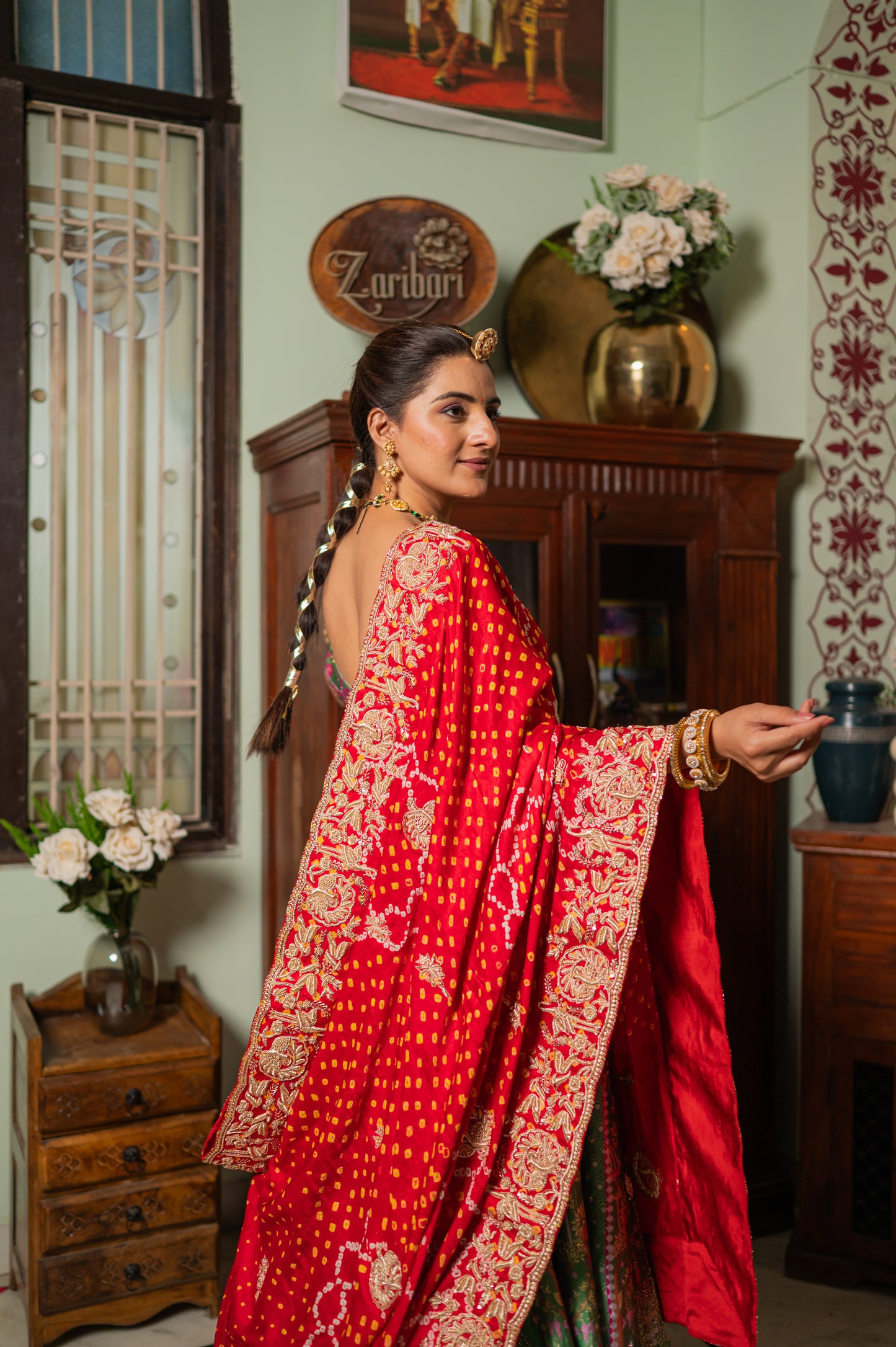 A stunning red gajji silk bandhej chunari featuring marodi birds motifs zardozi sequins work chunari beautifully adorned with fine craftsmanship and exquisite detailing, perfect for festive and special occasions.