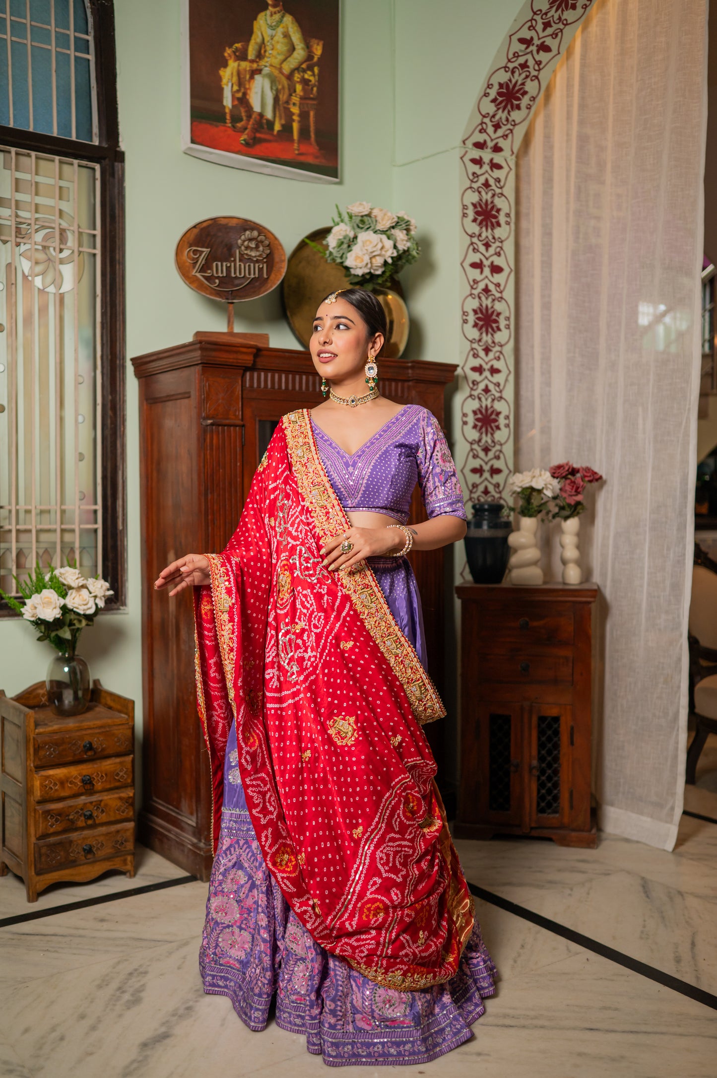 A stunning red gajji silk bandhej chunari featuring marodi zardozi thread elephant motifs sequins work chunari beautifully adorned with fine craftsmanship and exquisite detailing, perfect for festive and special occasions.