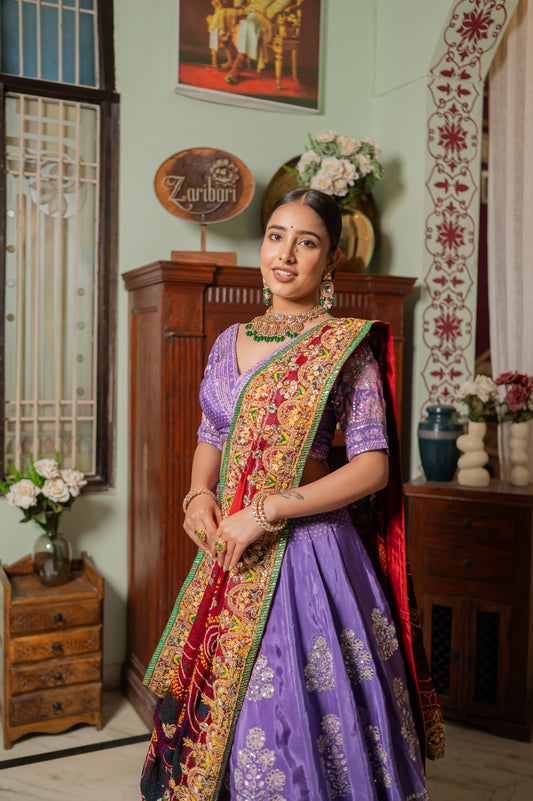 A stunning red pure ojariya bandhej chunari featuring gota patti thread sequins and beads work chunari beautifully adorned with fine craftsmanship and exquisite detailing, perfect for festive and special occasions.