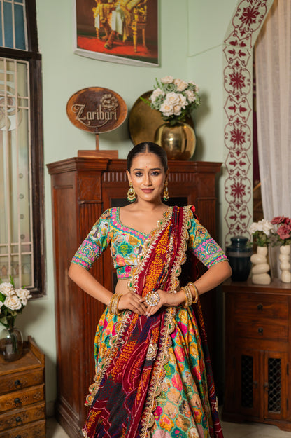 A stunning red pure ojariya bandhej chunari featuring zardozi thread kardana sequins work chunari beautifully adorned with fine craftsmanship and exquisite detailing, perfect for festive and special occasions.