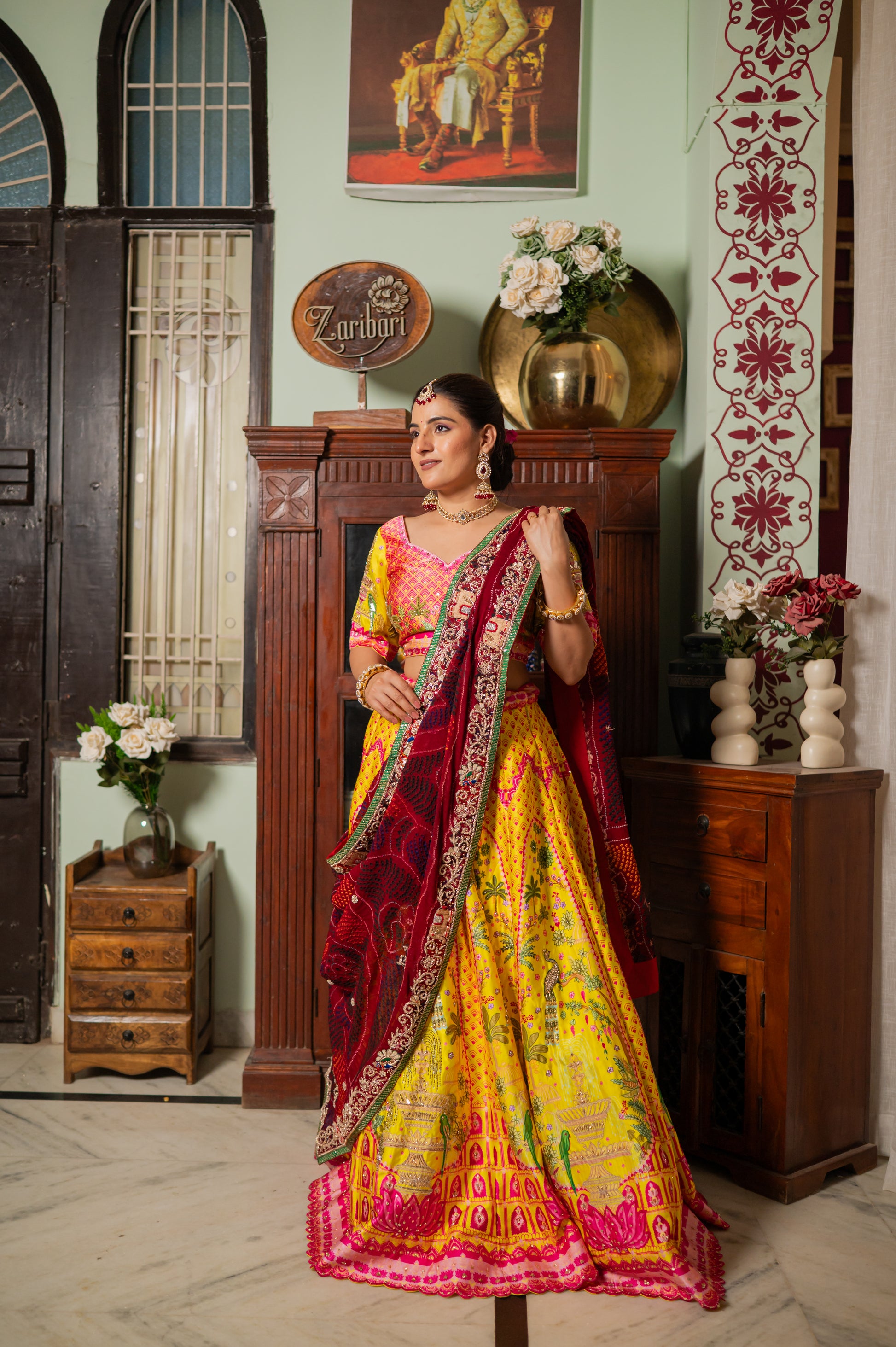 A stunning red pure ojariya bandhej chunari featuring marodi zardozi small peacock motifs sequins work chunari beautifully adorned with fine craftsmanship and exquisite detailing, perfect for festive and special occasions.