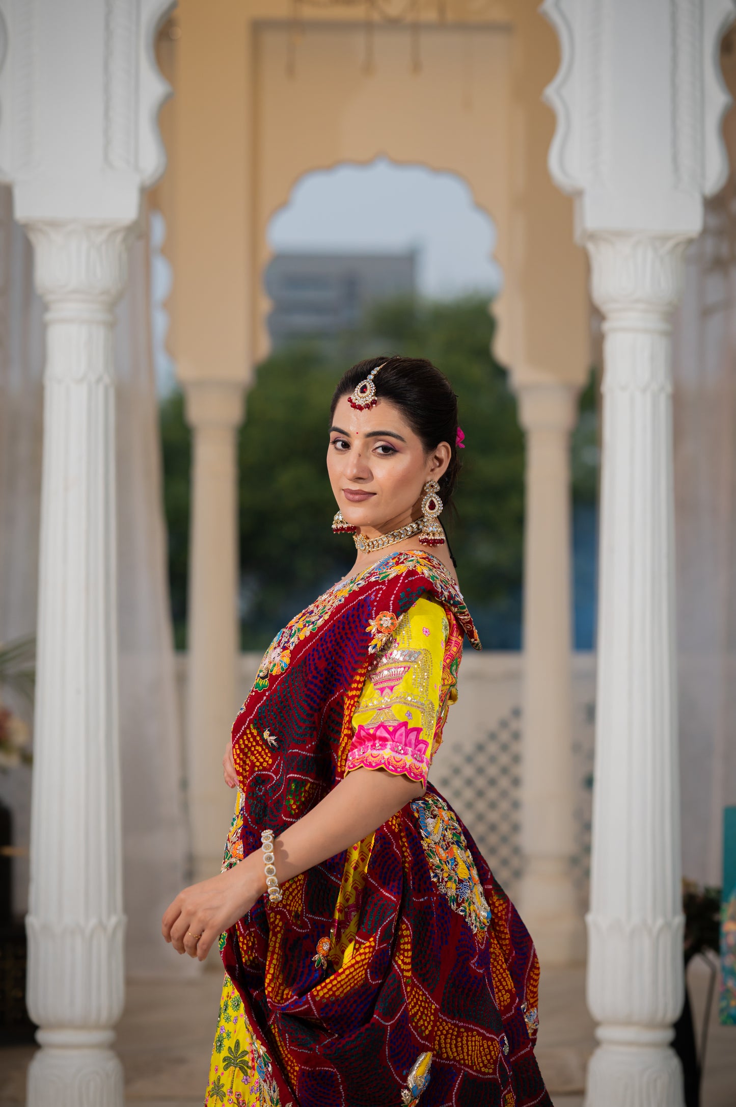 Maroon Pure Ojariya Bandhej Chunari with Marodi Zardozi Thread Radha Krishna Motifs Sequins Work