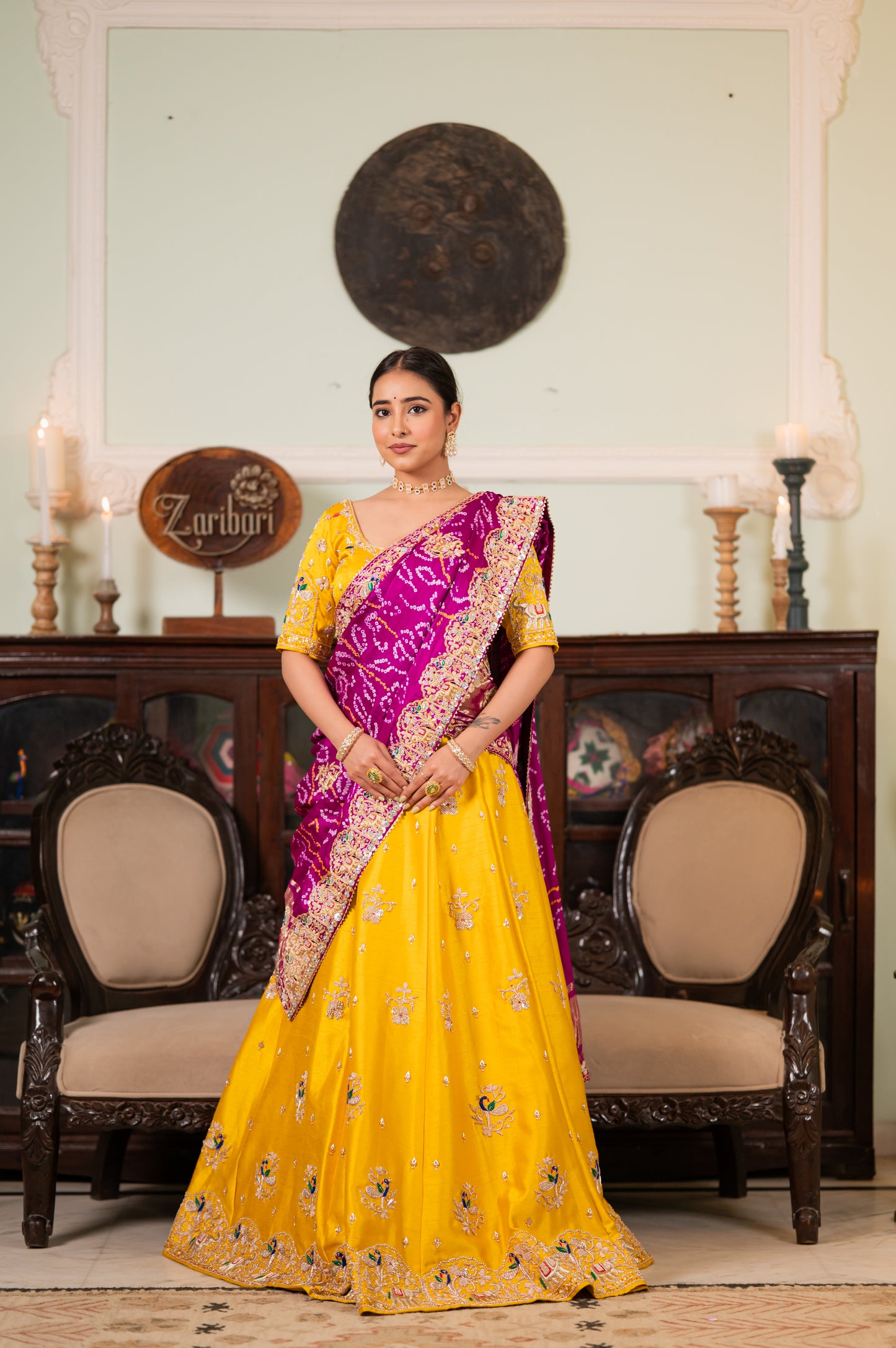 A stunning purple pure ojariya bandhej chunari featuring marodi zardozi thread elephant peacock motifs sequins work chunari beautifully adorned with fine craftsmanship and exquisite detailing, perfect for festive and special occasions.