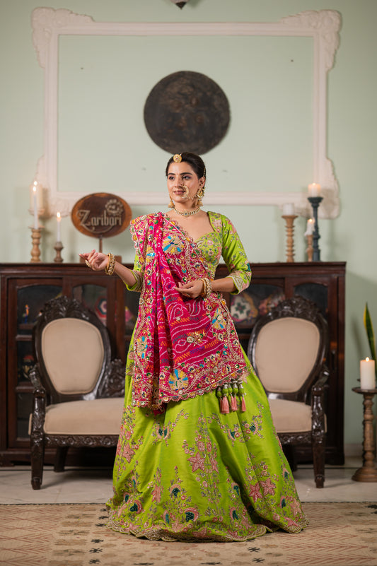 A stunning pink pure ojariya bandhej chunari featuring zardozi peacock motifs kardana sequins beads work chunari beautifully adorned with fine craftsmanship and exquisite detailing, perfect for festive and special occasions.