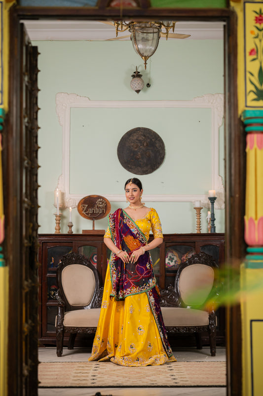 A stunning maroon pure ojariya bandhej chunari featuring zardozi peacock motifs sequins work chunari beautifully adorned with fine craftsmanship and exquisite detailing, perfect for festive and special occasions.