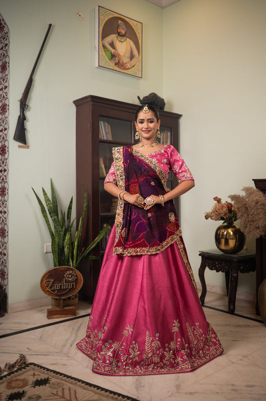 A stunning maroon pure ojariya bandhej chunari featuring zarodozi double peacock motifs sequins work chunari beautifully adorned with fine craftsmanship and exquisite detailing, perfect for festive and special occasions.