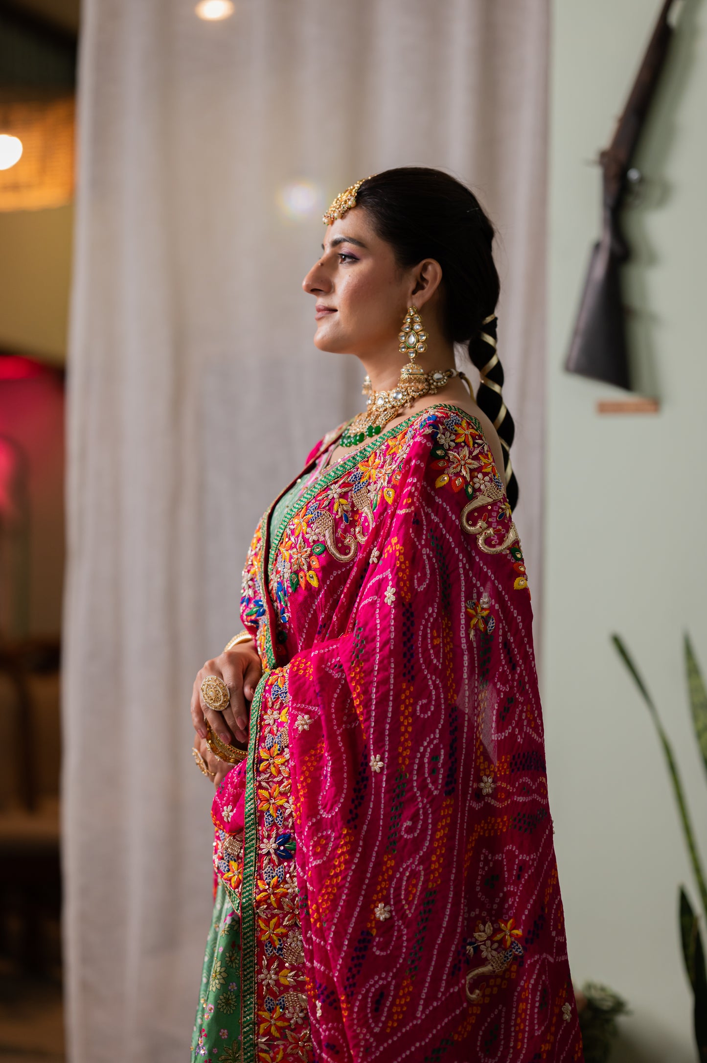 A stunning pink pure ojariya bandhej chunari featuring zardozi double peacock motifs thread work chunari beautifully adorned with fine craftsmanship and exquisite detailing, perfect for festive and special occasions.